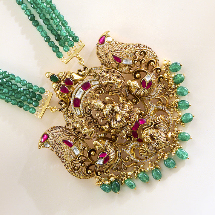 Imperial Pendant and Earring Set in Antique Lakshmi Design with Kundan Detailing