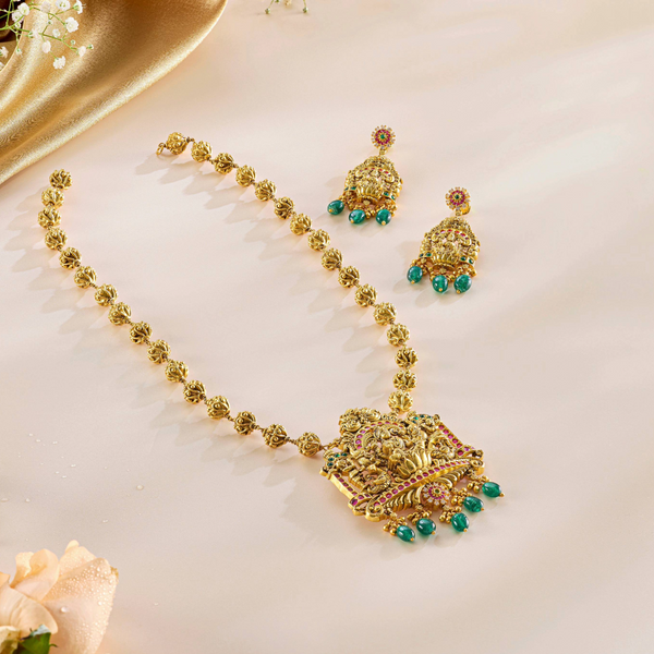Lakshmi Temple Pendant Set in Antique Gold with Green Drops