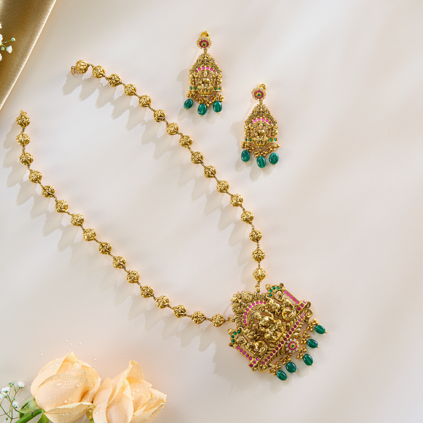 Lakshmi Temple Pendant Set in Antique Gold with Green Drops