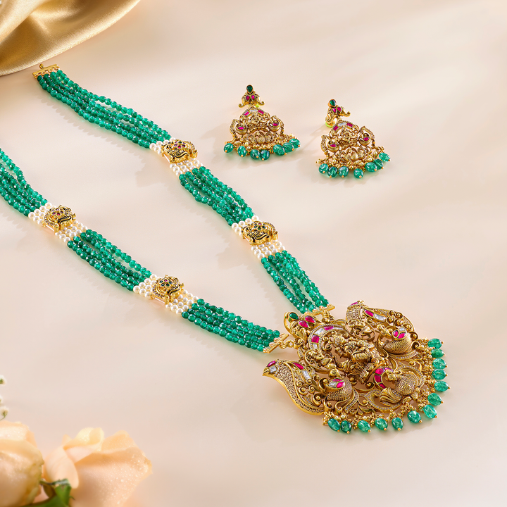 Imperial Pendant and Earring Set in Antique Lakshmi Design with Kundan Detailing