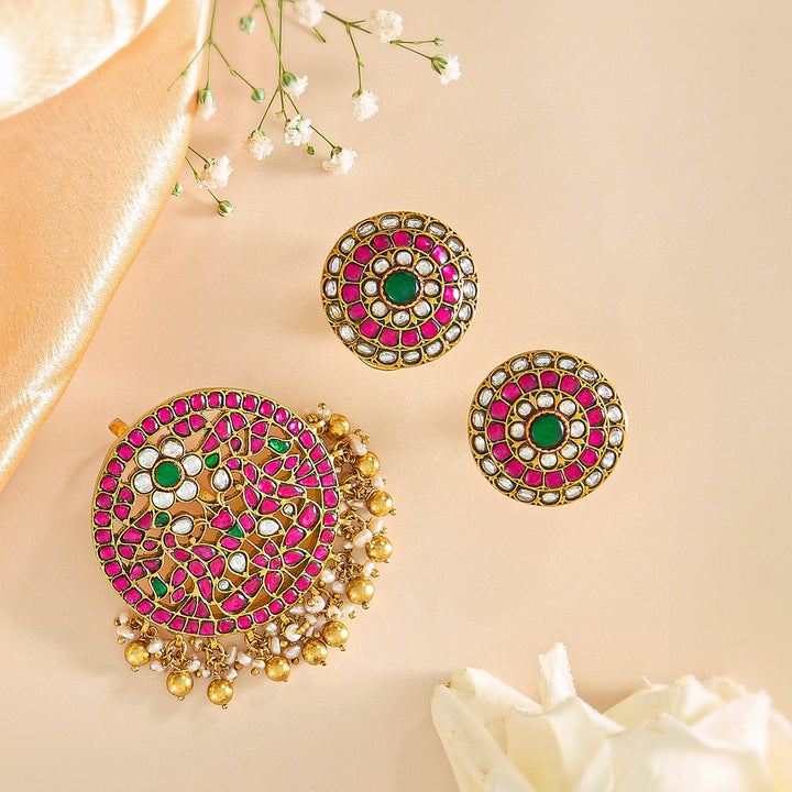Vibrant Pink Kundan Gold Pendant Set with Green Accents