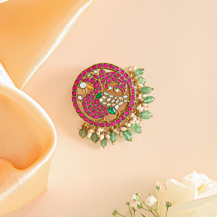 Elegant Peacock Pendant with Pink and Green Flourishes