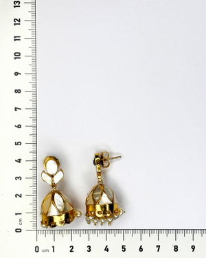 A pair of gold-toned dangle earrings.