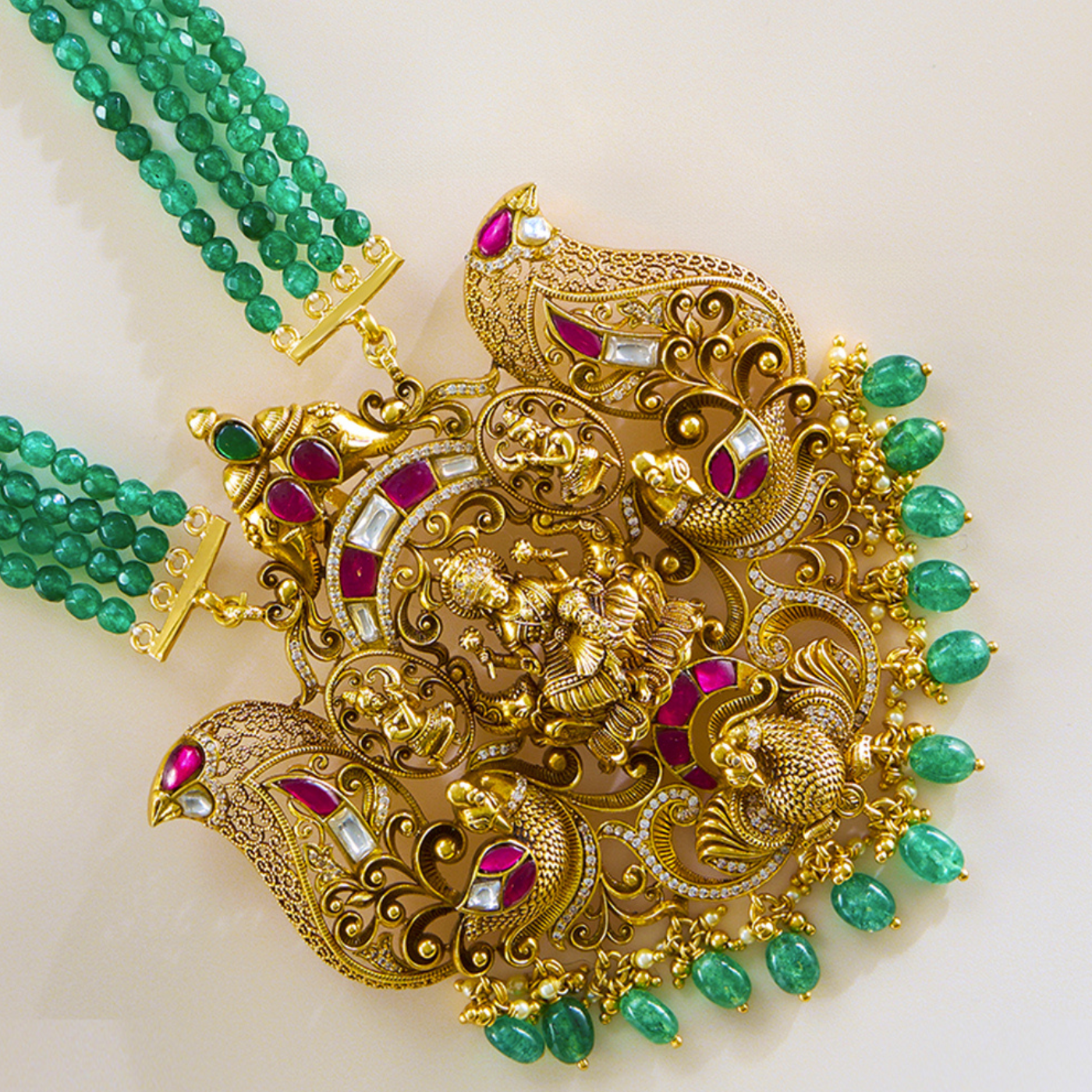Imperial Pendant and Earring Set in Antique Lakshmi Design with Kundan Detailing