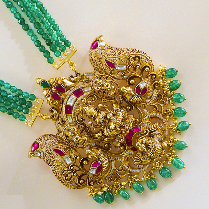 Imperial Pendant and Earring Set in Antique Lakshmi Design with Kundan Detailing