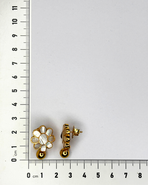 A pair of vintage gold-tone flower stud earrings.