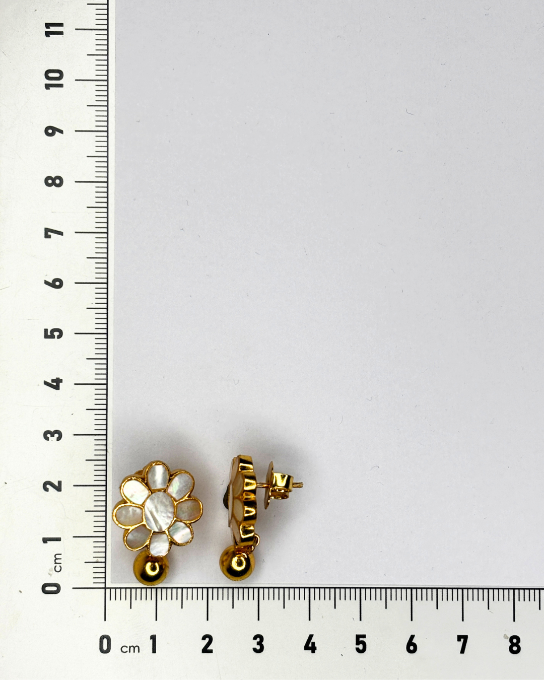 A pair of vintage gold-tone flower stud earrings.